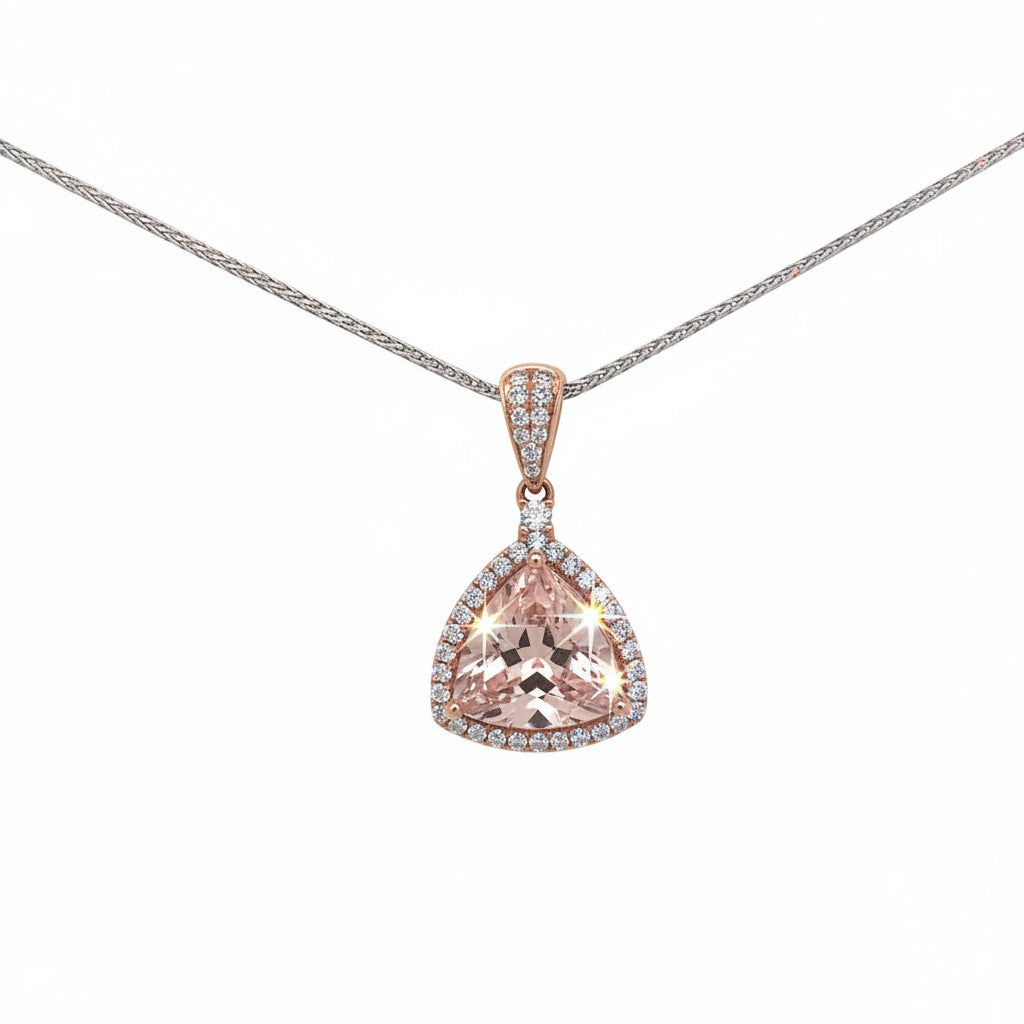 Caribbean Gems 14kt rose gold pendant featuring a trillion-cut morganite stone surrounded by sparkling diamonds.