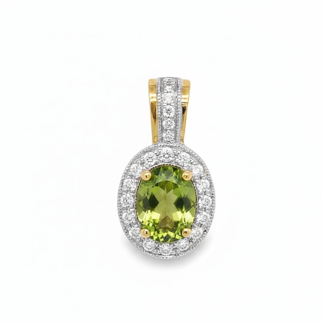 Caribbean Gems oval peridot pendant surrounded by a halo of white diamonds set in yellow and white gold