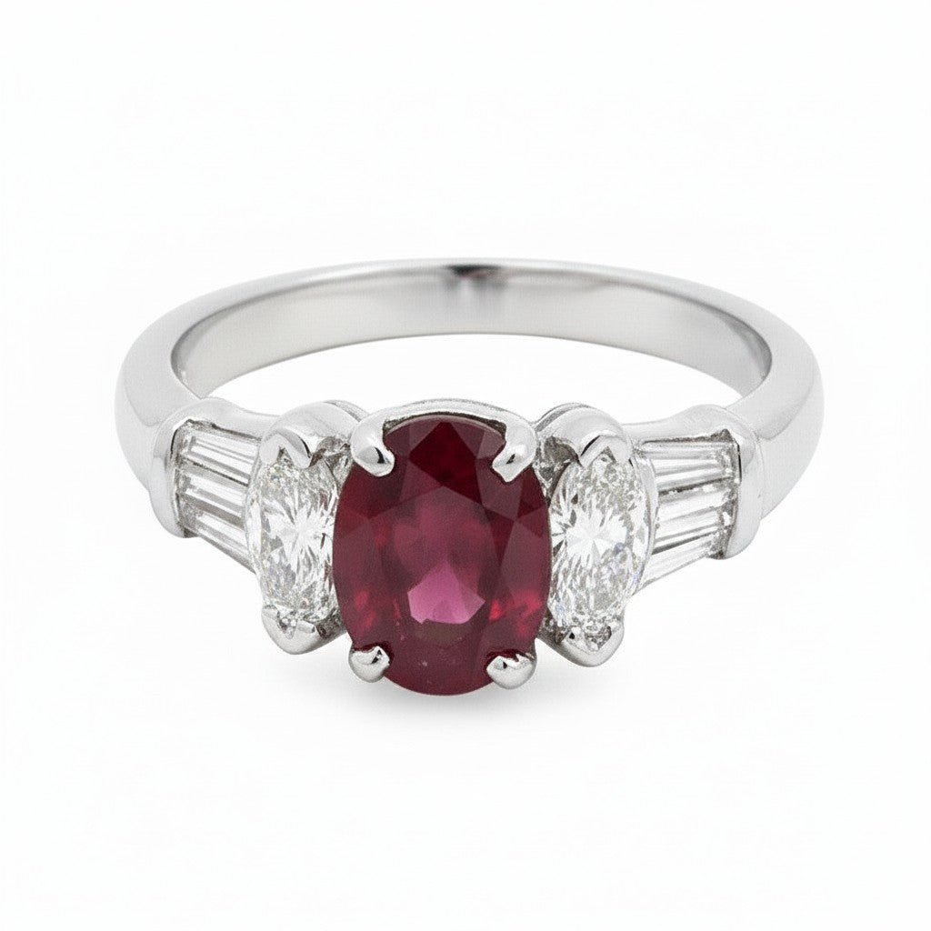 Caribbean Gems 14kt white gold ring featuring a 1.80ct oval ruby with baguette and marquise diamond accents.