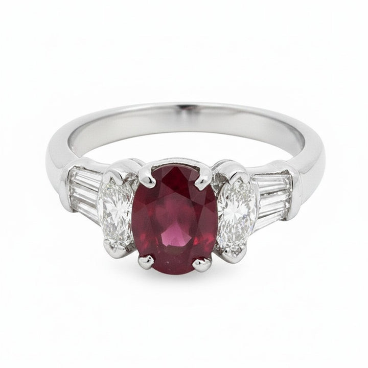 Caribbean Gems 14kt white gold ring featuring a 1.80ct oval ruby with baguette and marquise diamond accents.