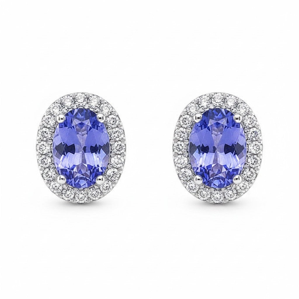 Caribbean Gems oval tanzanite and diamond halo stud earrings set in 14kt white gold