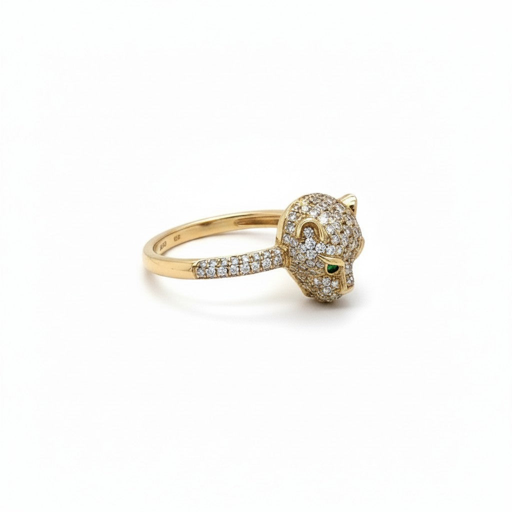 Caribbean Gems 14kt yellow gold panther ring with pave diamonds and a vibrant green tsavorite gemstone eye.