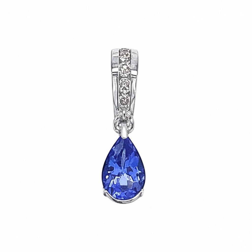 Caribbean Gems pear-shaped tanzanite pendant with diamond accents in 14k white gold on a white background