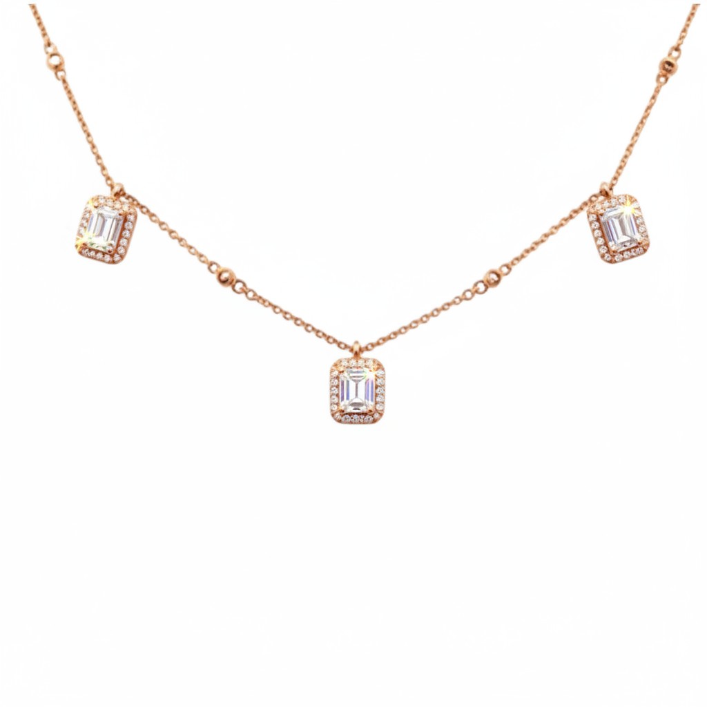 Caribbean Gems ornate baguette diamond necklace in 14kt rose gold with round diamond halo accents on a delicate chain.