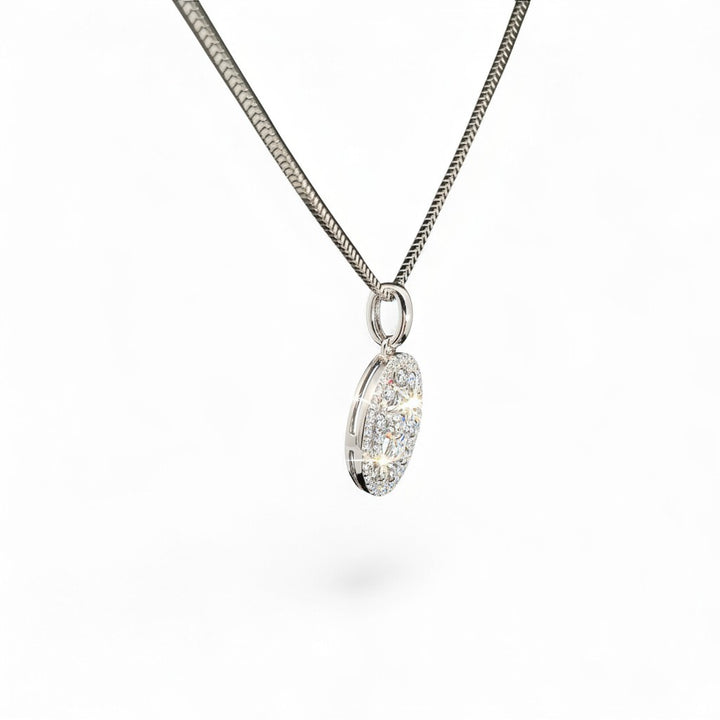 Caribbean Gems round diamond pendant in 14k white gold on a matching chain, featuring sparkling pavé-set diamonds.