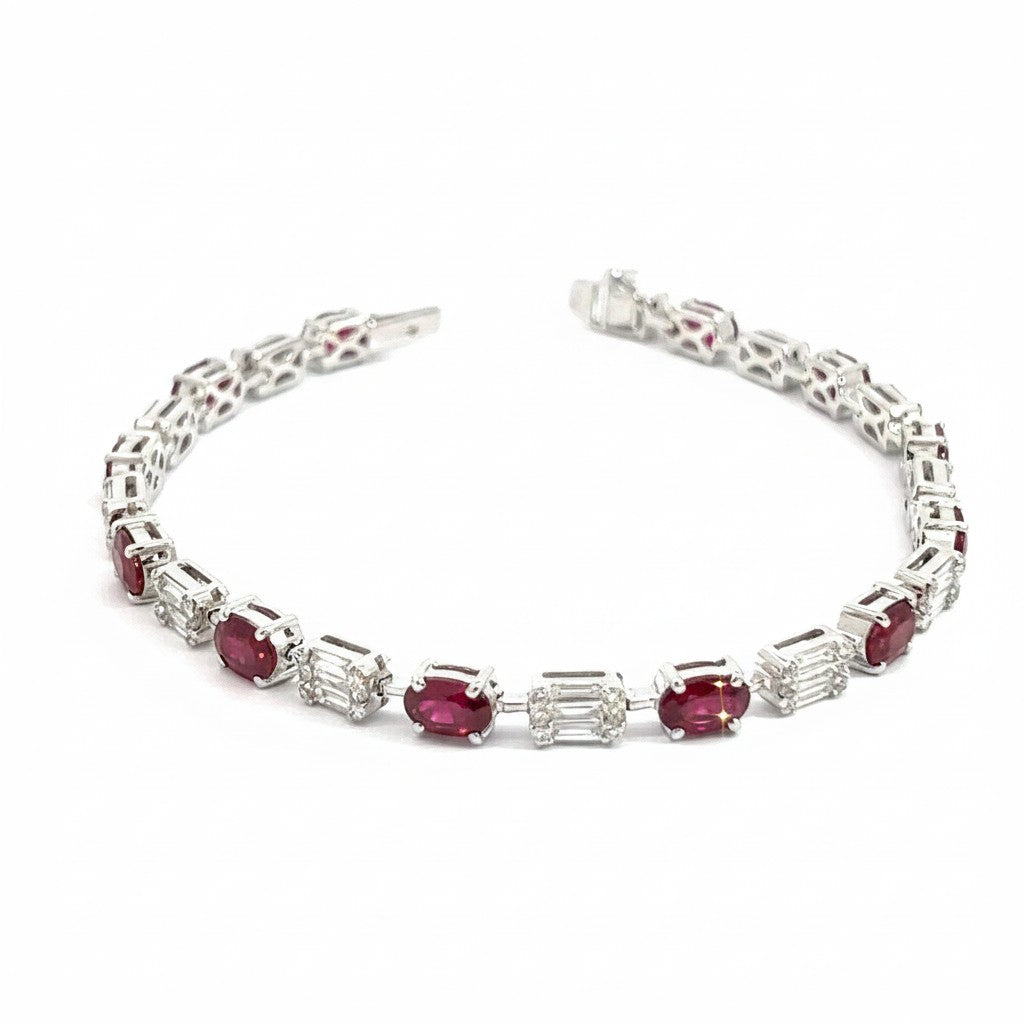 Caribbean Gems ruby and diamond bracelet featuring oval rubies and baguette diamonds set in 18k white gold.