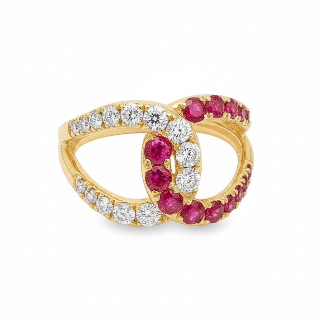 Caribbean Gems gold ring featuring a crossover design with alternating round rubies and sparkling white diamonds.