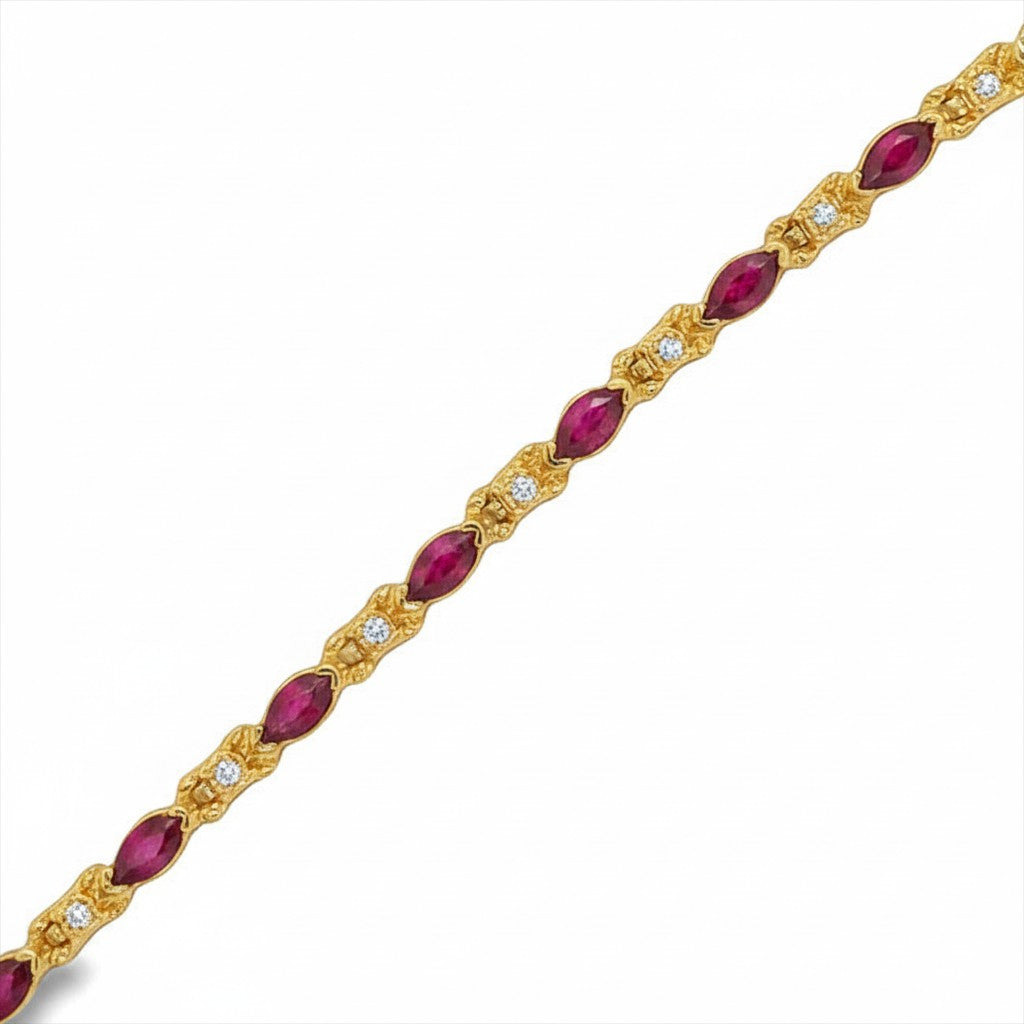 Caribbean Gems 14kt yellow gold bracelet with marquise-cut rubies and round diamonds in a delicate link setting.