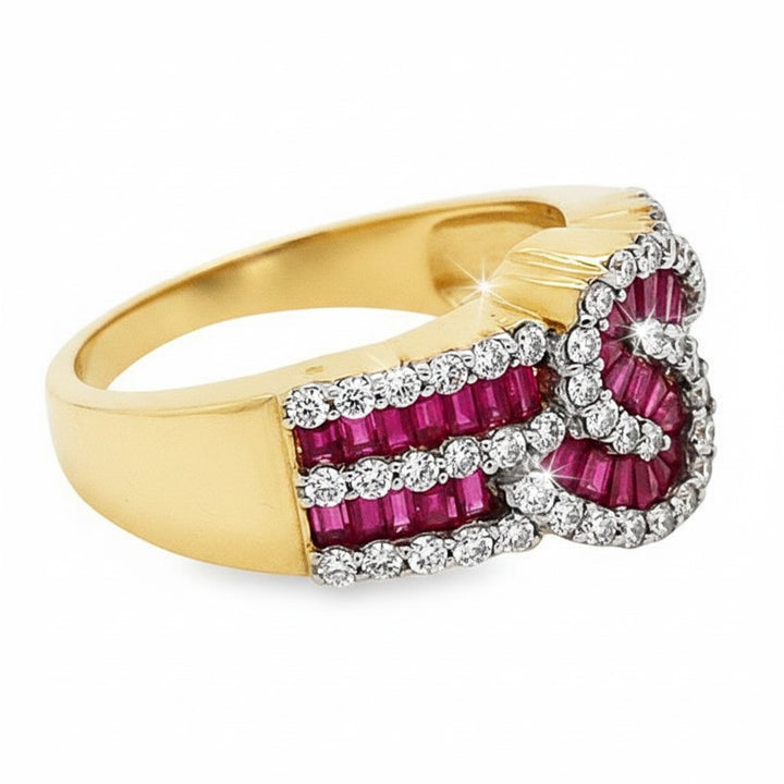 Caribbean Gems 14kt yellow gold ring featuring baguette rubies and round diamonds in a fancy swirl design