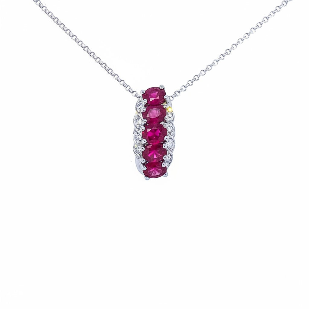 Caribbean Gems ladies ruby and diamond pendant featuring five oval rubies accented by small diamonds in white gold