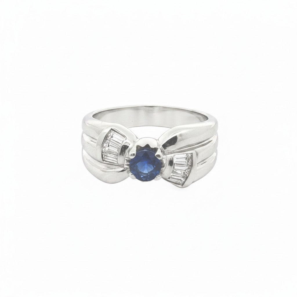 Caribbean Gems radiant sapphire and diamond ring in 14kt white gold with a round blue sapphire and baguette diamonds