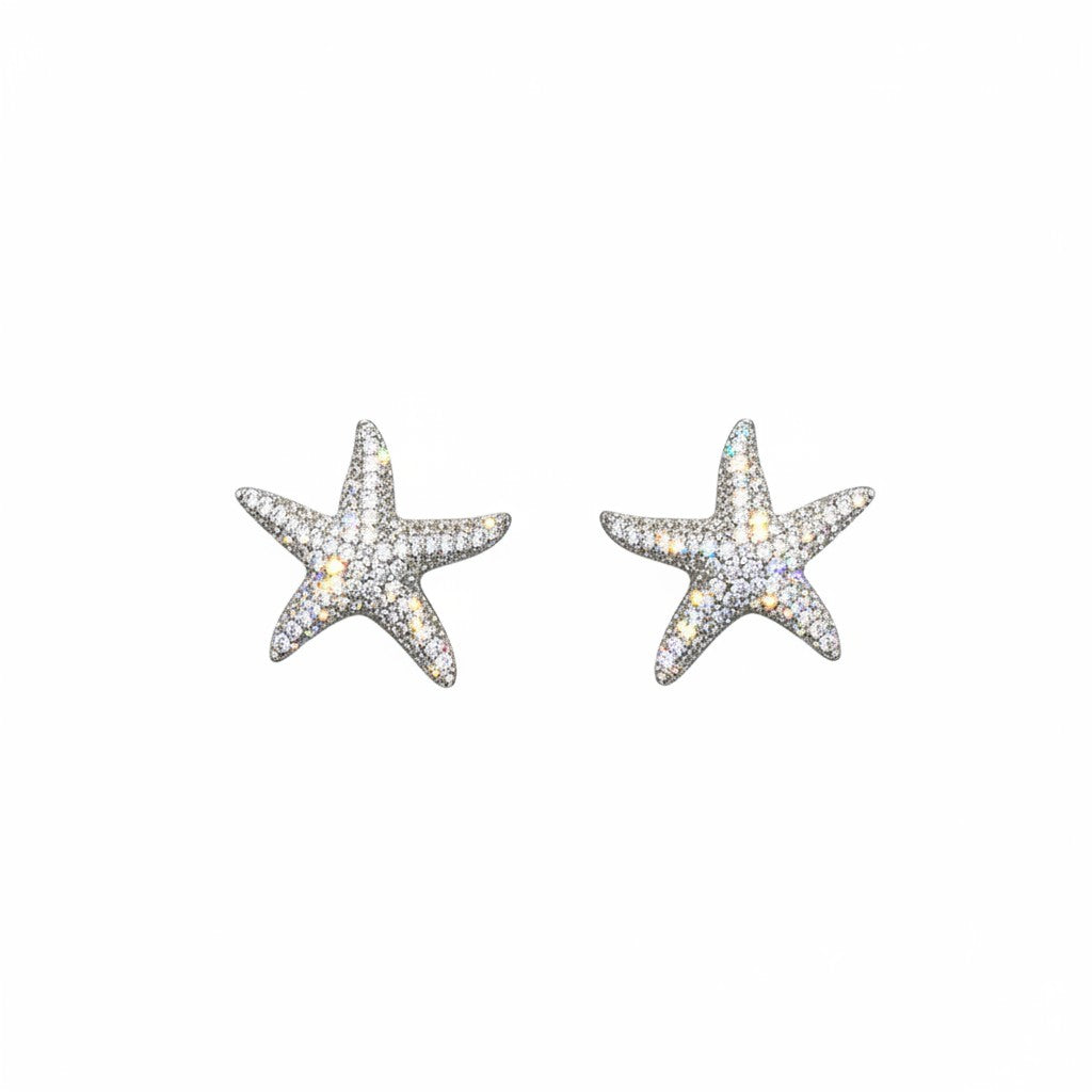 Caribbean Gems starfish earrings in 14k gold with sparkling white diamonds on a clean white background