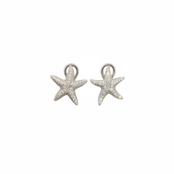 Caribbean Gems 14k gold starfish earrings encrusted with sparkling white diamonds on a clean white background