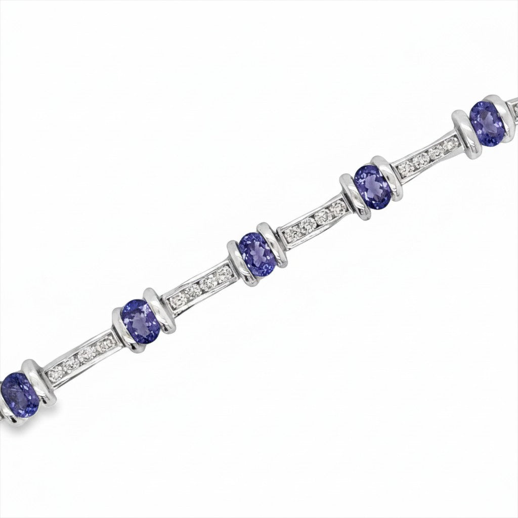 Caribbean Gems 14kt white gold bracelet featuring oval tanzanite stones and sparkling round diamonds