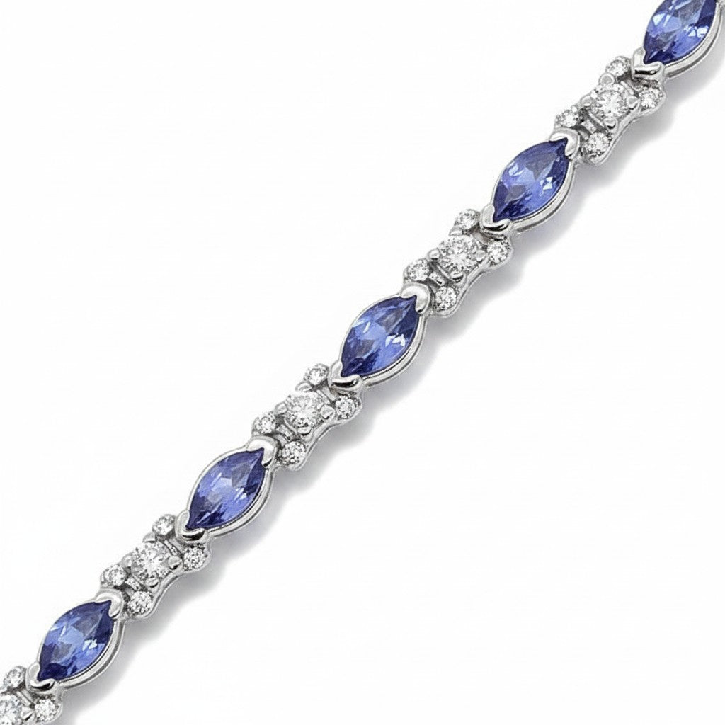 Caribbean Gems 14kt white gold bracelet featuring marquise-cut tanzanite and round diamonds in a delicate link design.