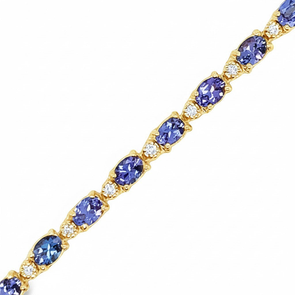 Caribbean Gems 14kt yellow gold bracelet featuring oval tanzanite stones and round diamond accents.