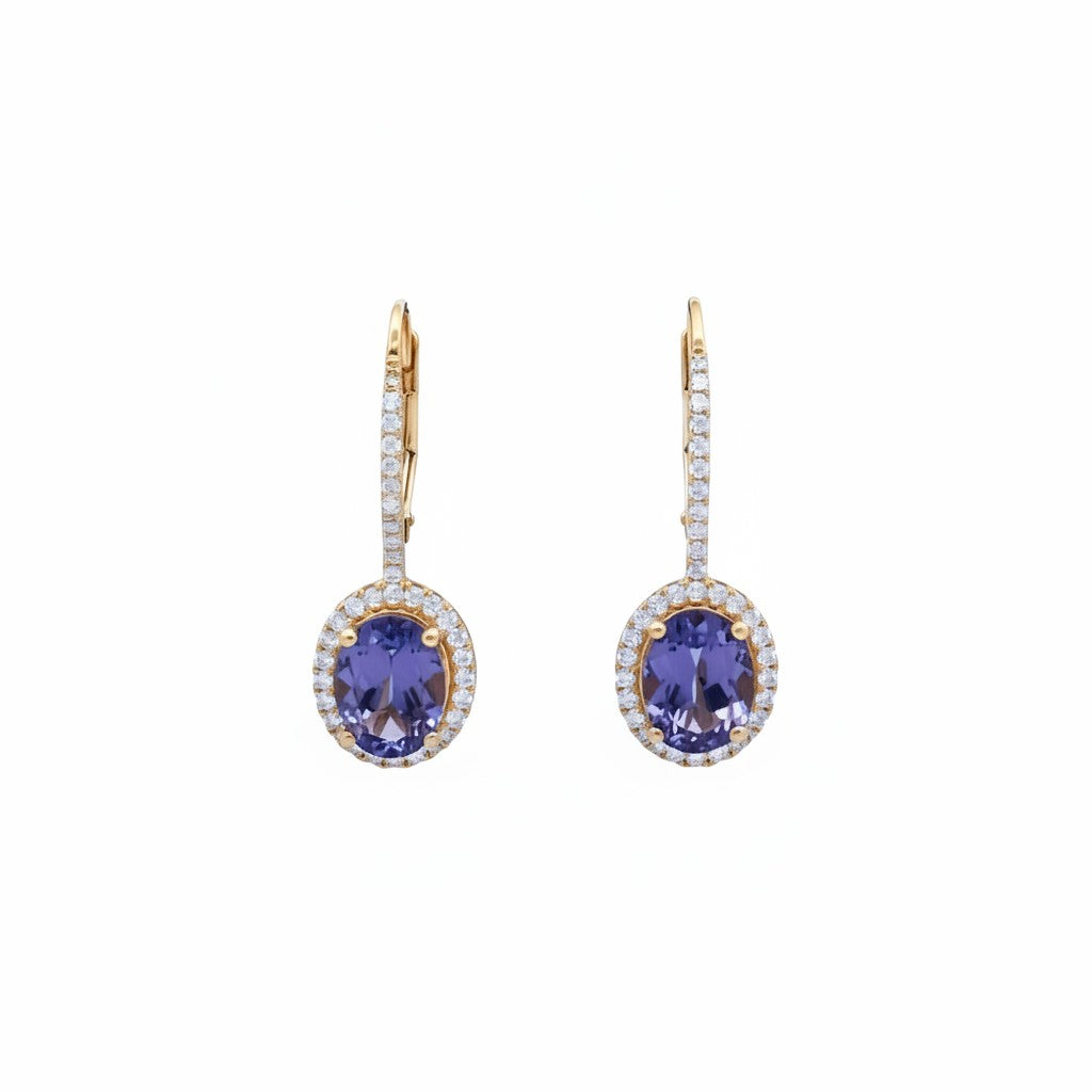 Caribbean Gems 14kt yellow gold drop earrings with oval tanzanite stones and diamond halos on lever backs.