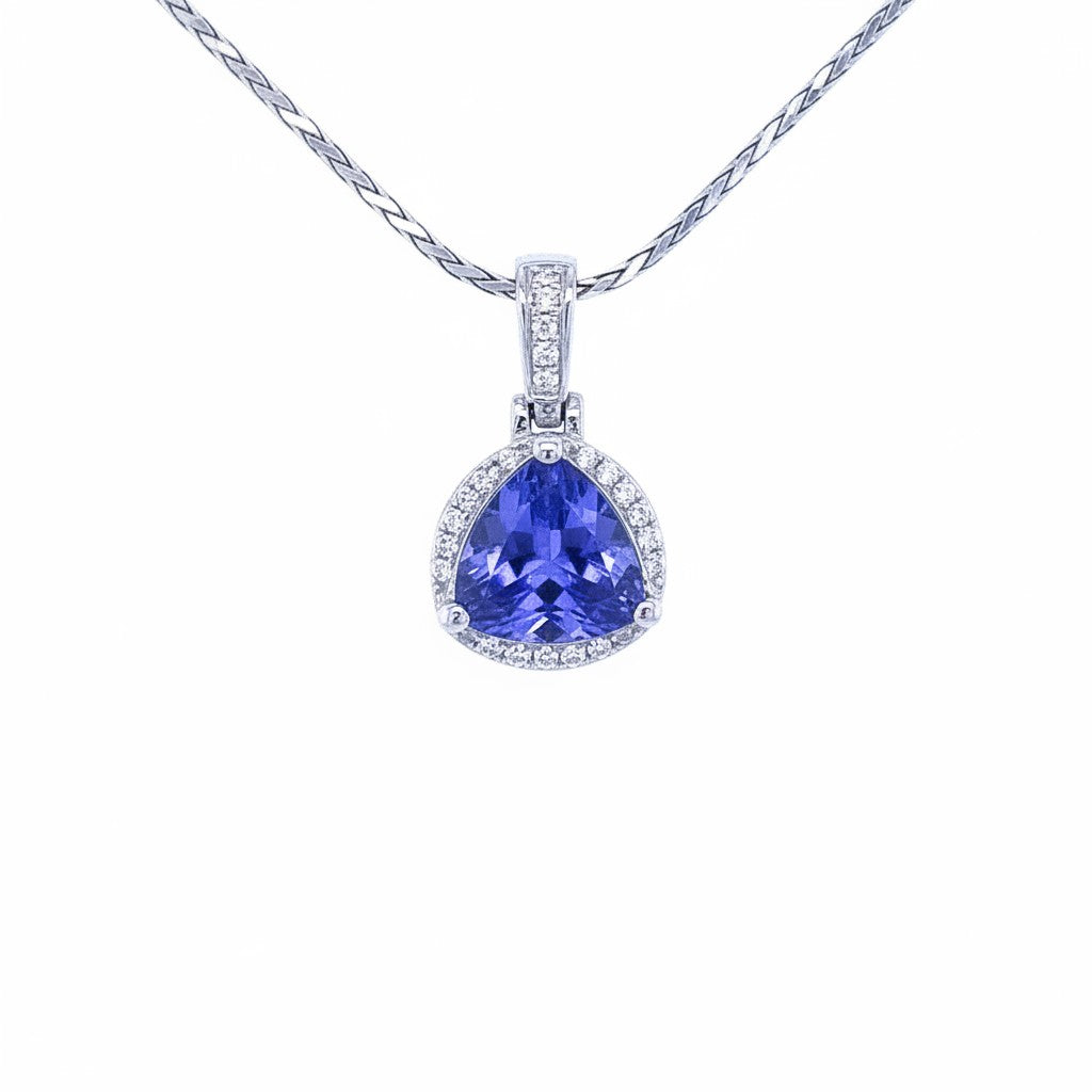 Caribbean Gems trillion-cut tanzanite pendant with diamond halo in 14kt white gold on a silver chain