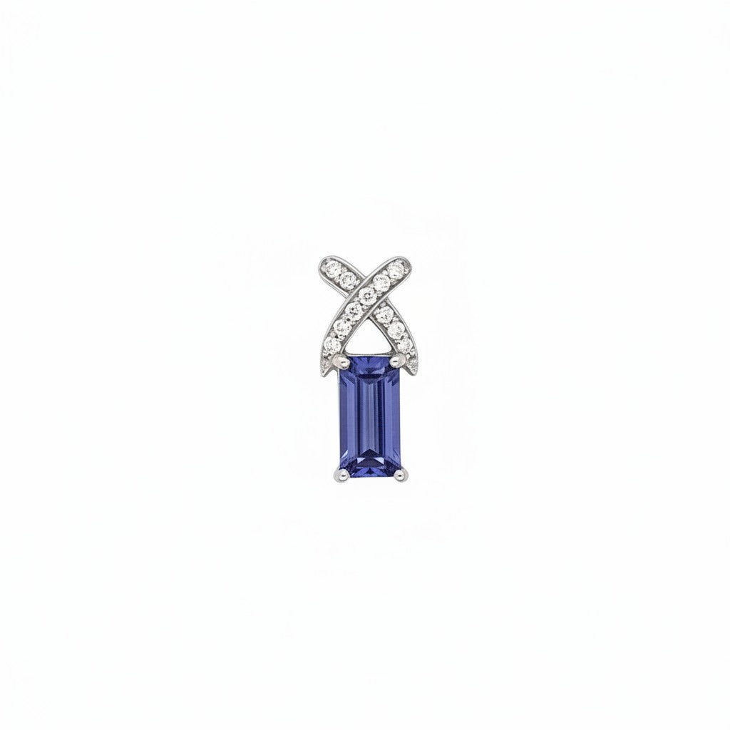 Caribbean Gems 14kt white gold pendant featuring a 1.52ct baguette tanzanite and 0.15ct round diamond accents.