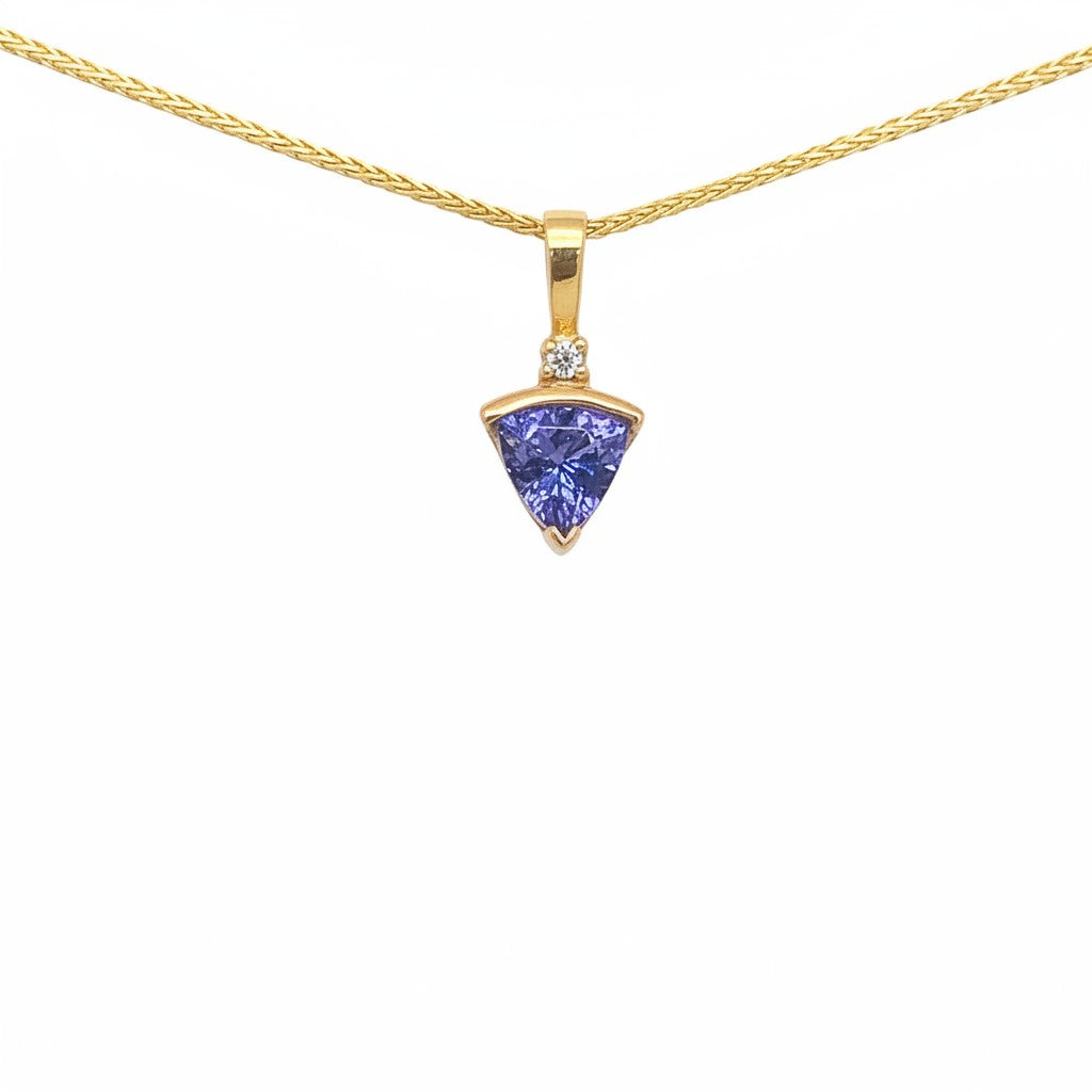 Caribbean Gems trillion-cut tanzanite and round diamond pendant set in 14kt yellow gold on a gold chain