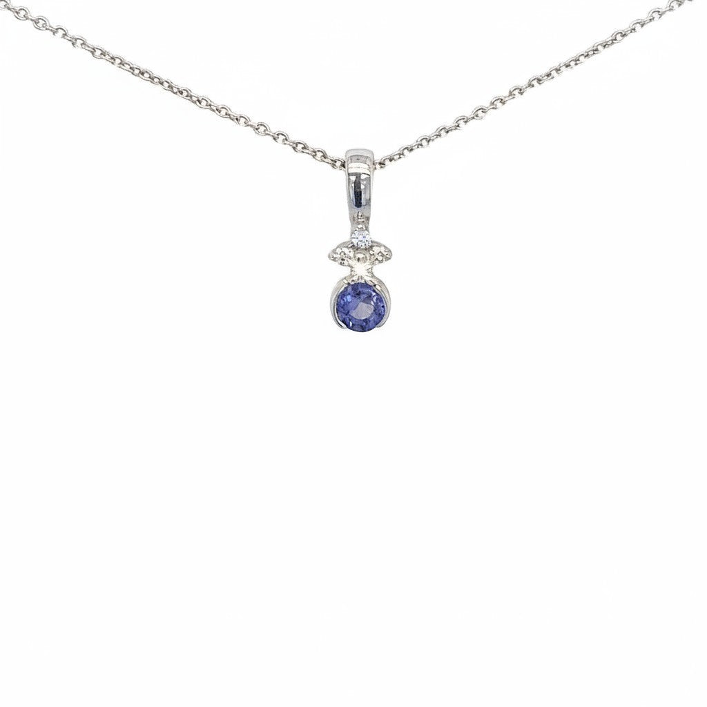 Caribbean Gems round tanzanite and diamond pendant set in 14kt white gold on a delicate chain