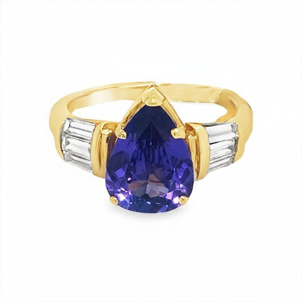 Caribbean Gems 14kt yellow gold ring with a 2.63ct pear-shaped tanzanite and baguette-cut diamond accents.