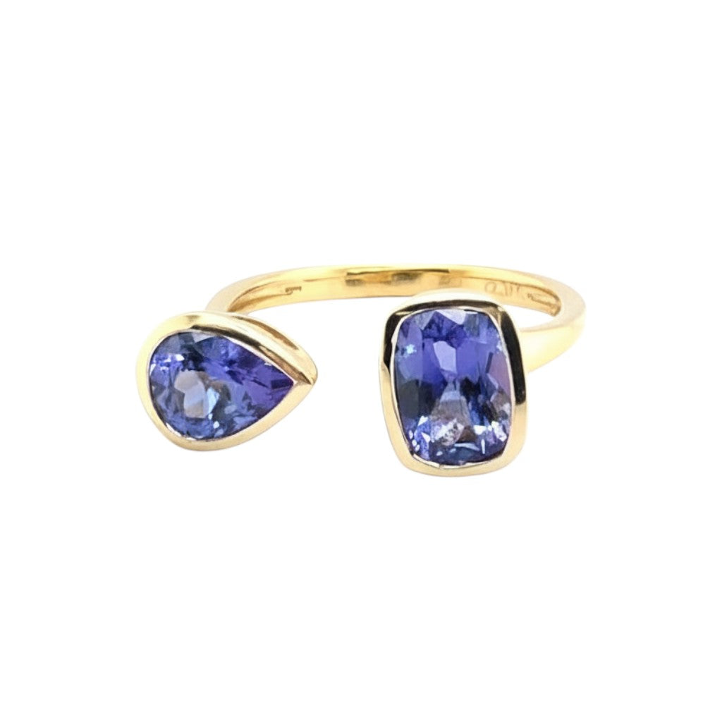 Caribbean Gems 14kt yellow gold ring featuring pear and radiant cut violet-blue tanzanite gemstones