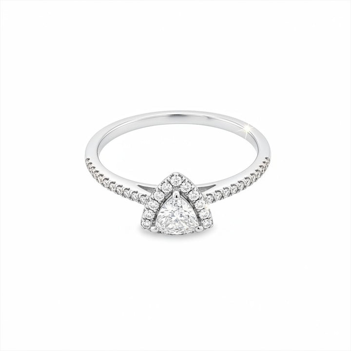 Caribbean Gems 14kt white gold ring featuring a trillion cut center diamond and round diamond halo and band.