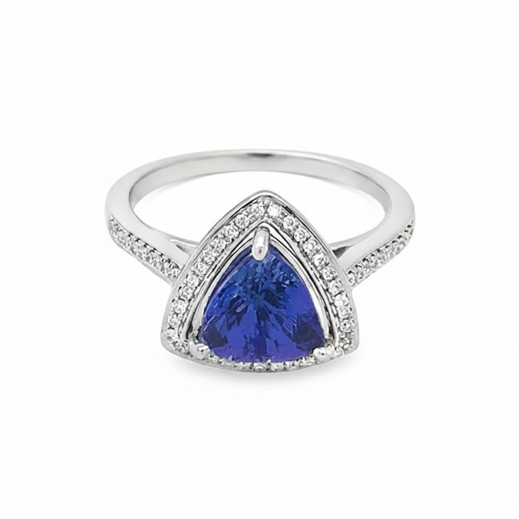 Caribbean Gems 14kt white gold ring featuring a 1.91ct trillion-cut tanzanite surrounded by round diamond accents.