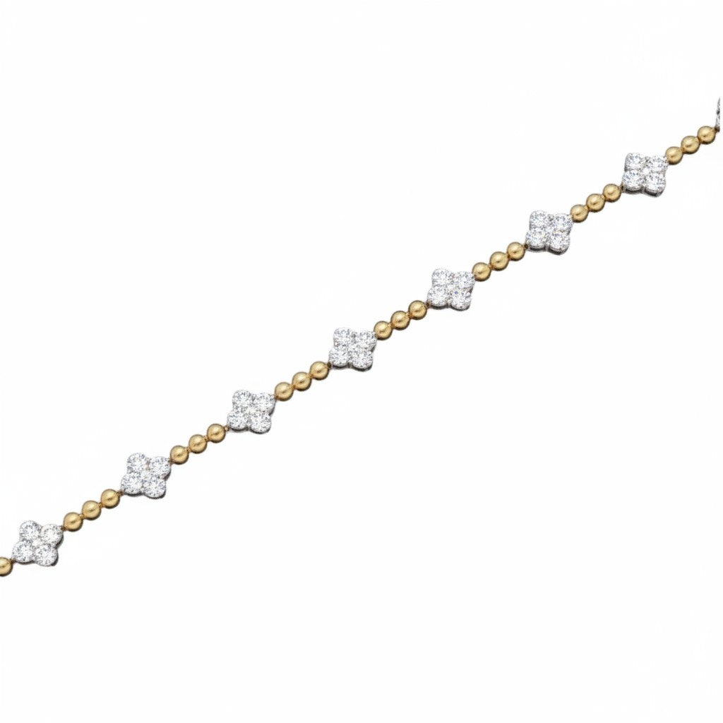 Caribbean Gems two-tone 14k gold bracelet with diamond-encrusted flower motifs and gold bead spacers