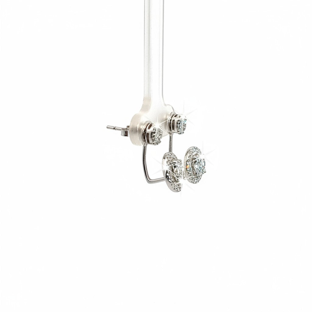 Caribbean Gems 18kt white gold diamond earrings featuring 1.07cts of round diamonds in a sparkling cluster setting.