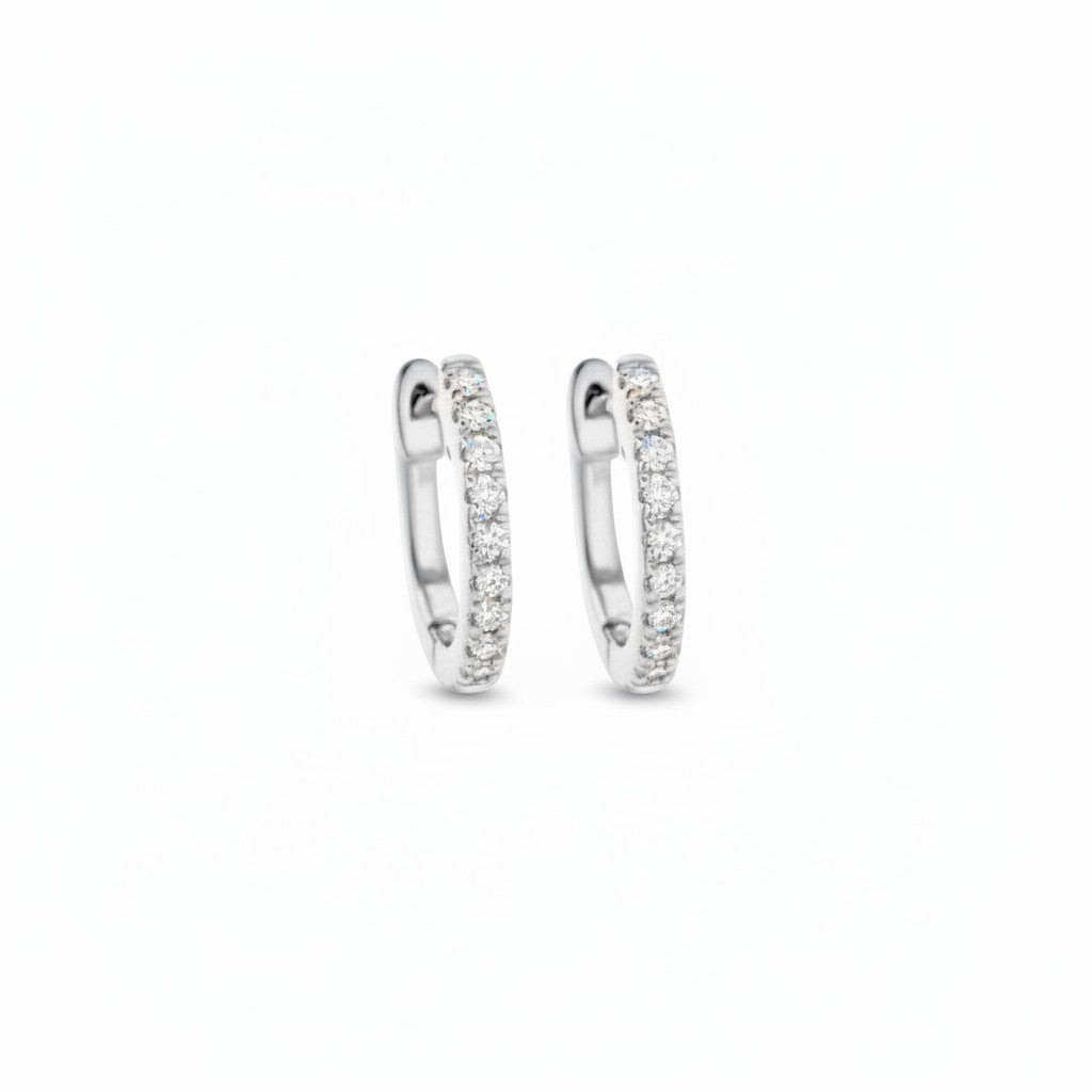 Caribbean Gems 14kt white gold hoop earrings featuring brilliant round diamonds in a classic, elegant design.