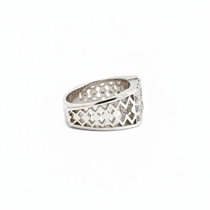 Caribbean Gems men's 14kt white gold diamond ring with intricate geometric side cutouts on a white background