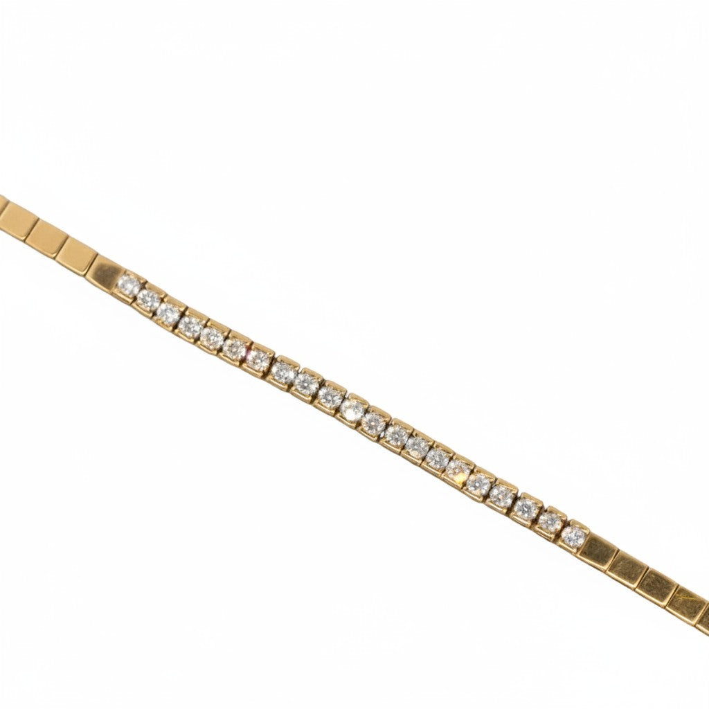 Caribbean Gems 14kt yellow gold tennis bracelet featuring 2.00 carats of brilliant round-cut diamonds.