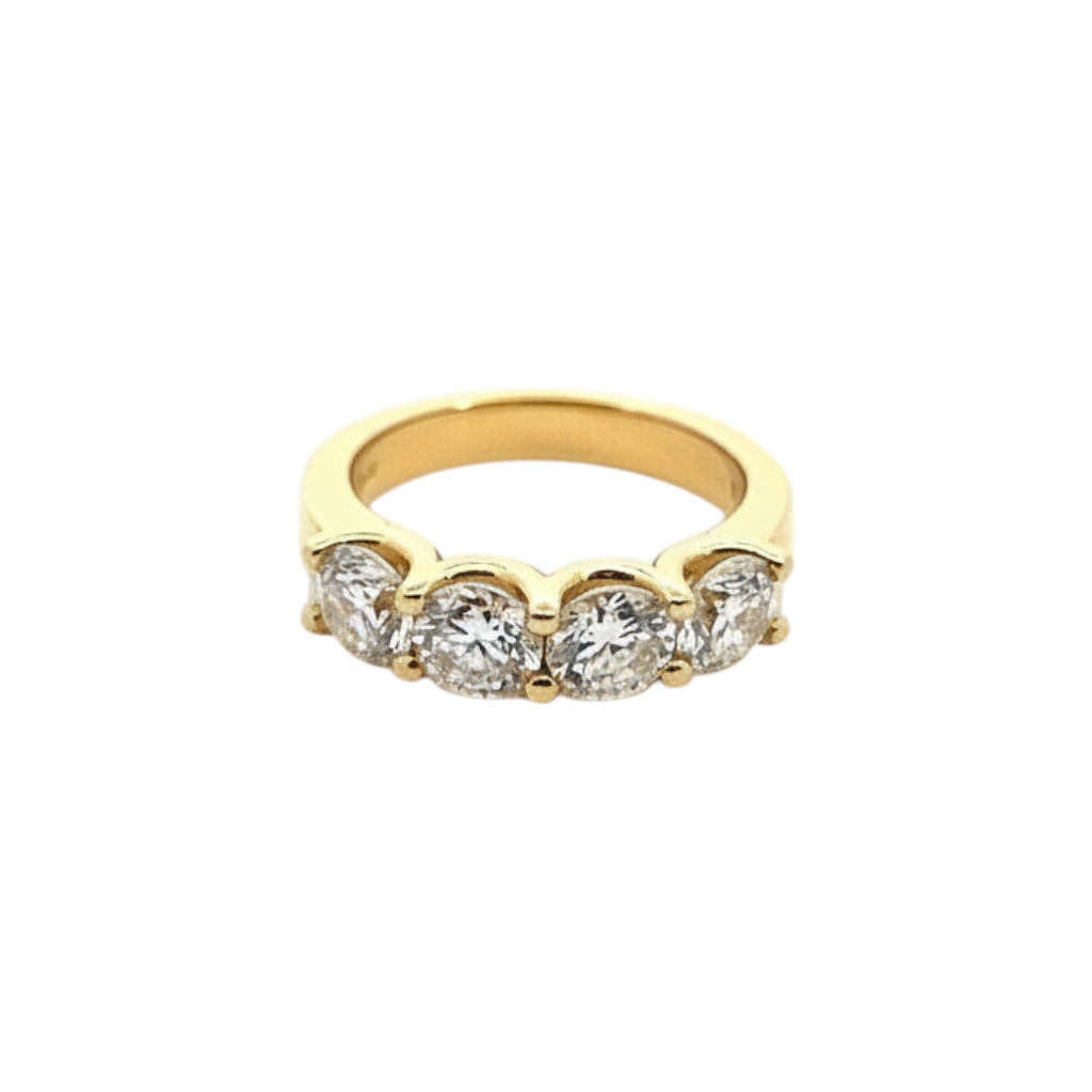Caribbean Gems 18kt yellow gold 4-stone diamond band featuring four round brilliant cut diamonds on a white background.