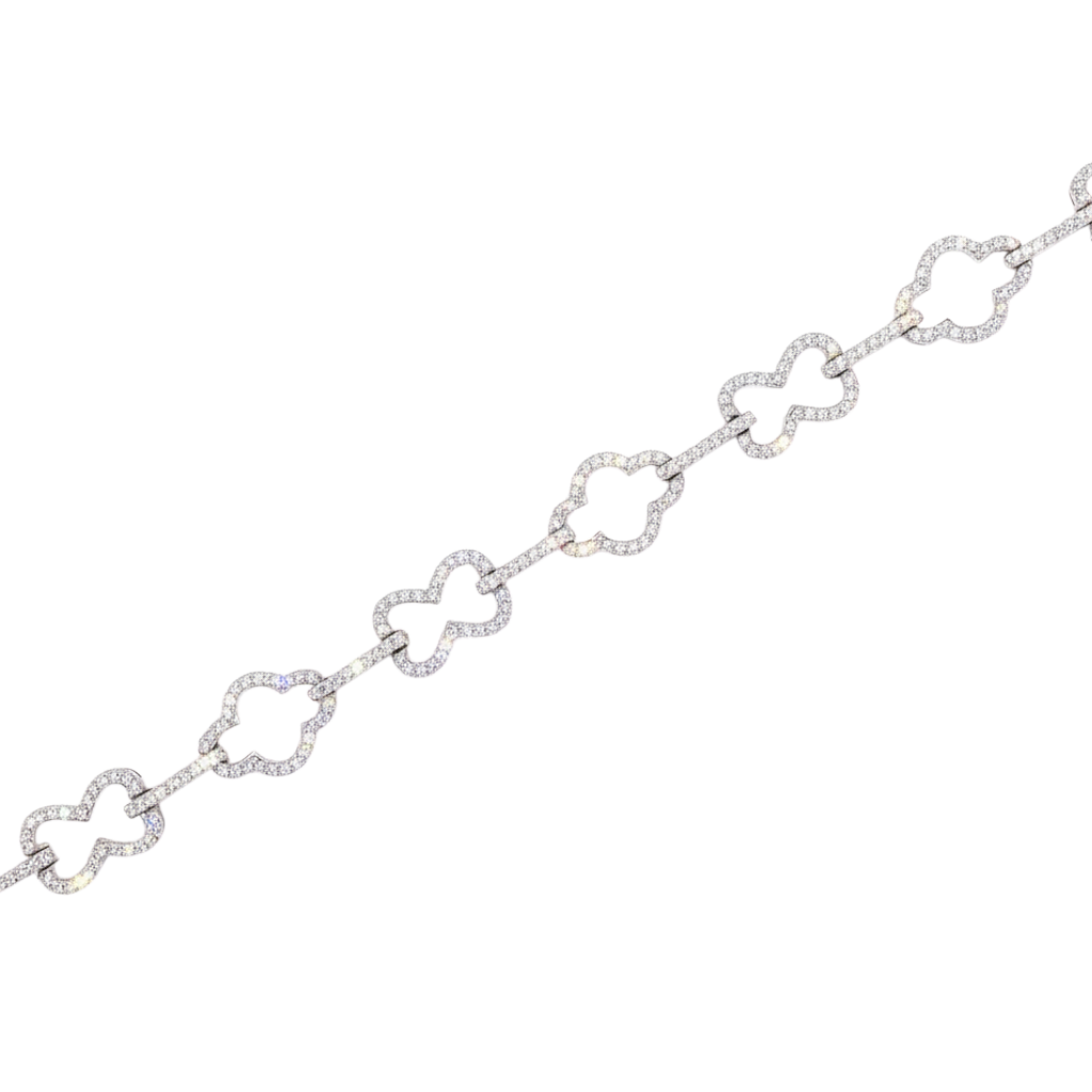 Caribbean Gems 18kt white gold diamond bracelet featuring clover-shaped links with 1.55 carats of brilliant diamonds.